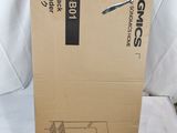 a box that has a pair of scissors in it