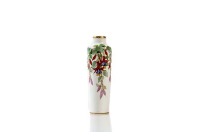 a white vase with a floral design on it