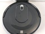 an image of a robotic vacuum cleaner sitting on top of a counter
