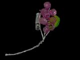 a pink flower that is attached to a silver wire