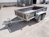 an image of a trailer that is parked in a lot