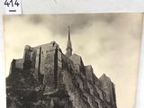 a picture of a picture of a castle with a clock on it