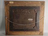 an old picture frame with a rope hanging from it ' s side