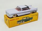 a toy car that is sitting on top of a box