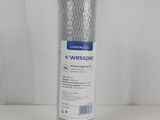 a close up of a roll of silver foil on a white background