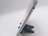 a close up of a cell phone on a stand