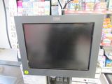 an image of a monitor on a stand in a store