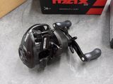 a close up of a box of fishing reels on a table