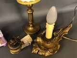 two lamps that are next to each other on a table