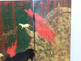 a picture of a room divider with a painting on it