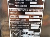 an image of a parking meter with a sticker on it