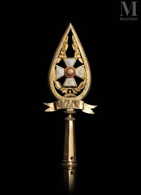 a close up of a gold trophy with a star on it