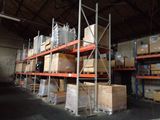 a large warehouse with a lot of boxes on the shelves