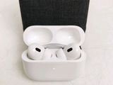 a pair of white airpods sitting in a case