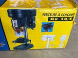 a close up of a box with a drill on it