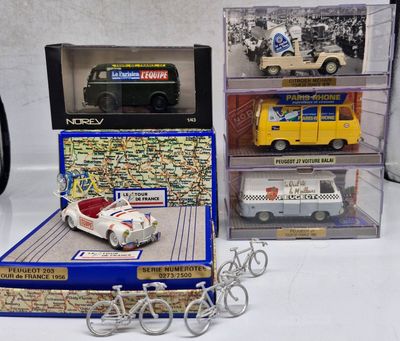 a box with a toy car and a toy van in it