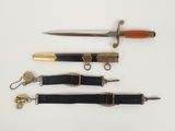 several different types of knives are lined up on a white surface