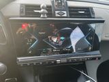 a picture of a car radio in the dash of a car