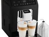 gros plan d'une machine à café avec deux tasses de café