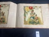 an open book with a picture of a couple of children on it