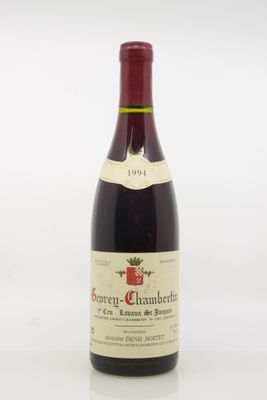 a bottle of wine that is sitting on a table