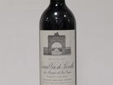a bottle of wine that is sitting on a table