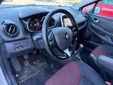 a car dashboard with a steering wheel and dashboard controls