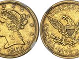 a gold coin with the head of a woman and a eagle on it