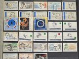 a picture of a collection of stamps on a black board