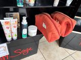 a shelf with a lot of beauty products on it