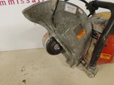 an image of a small concrete grinder in a garage