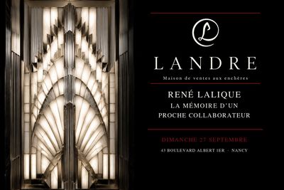 the front of a building with a sign that says landre
