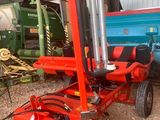 une image représentant un tracteur attelé à une remorque