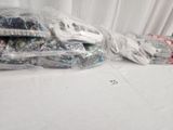 many bags of items that are sitting on a table