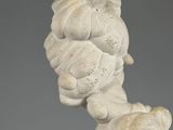 statue of a woman holding a baby in her arms