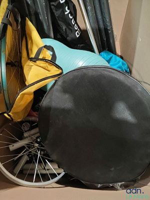a bike with a bag on the back of it