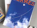 a magazine with a picture of a kite flying in the sky