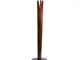 an image of a tall wooden and metal candle holder on a white background