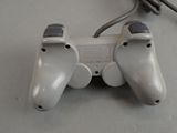 a video game controller that is sitting on a table