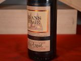a bottle of wine that is sitting on a table