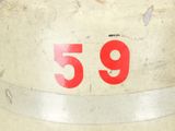a white fire hydrant with a red number 59 on it