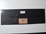 a black box with a label on it sitting on a table