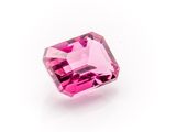 a pink tourmaline gems on a white background