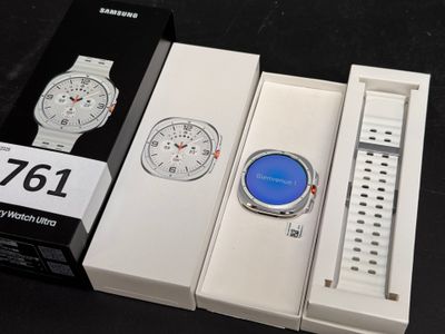a box with a watch inside of it and a box with a watch inside of it