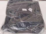 a plastic bag that has a black shirt in it