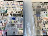 a picture of a binder with a lot of stamps on it