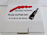 a box with a plug cutter in it sitting on a table