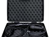 a black case with two microphones inside of it on a white background
