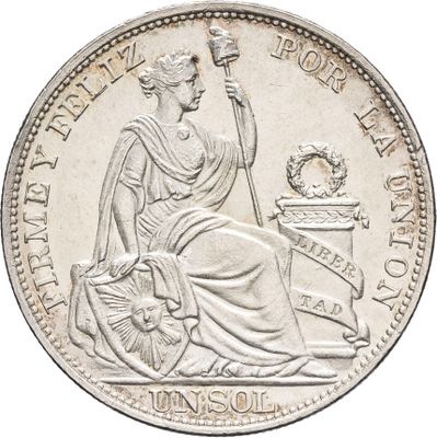 un gros plan d'une pièce de monnaie sur laquelle figure une femme assise sur une chaise