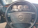a steering wheel and dashboard of a mercedes benz car